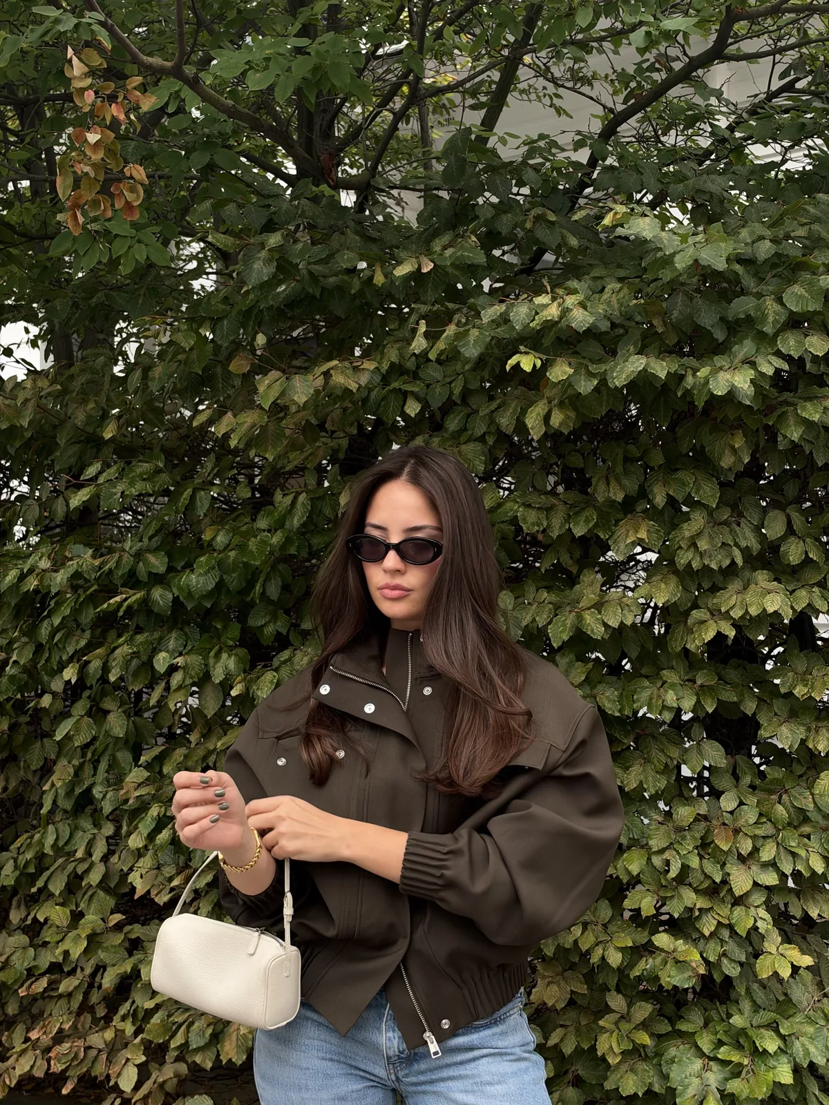 Woman with long, sleek and glossy dark brown hair